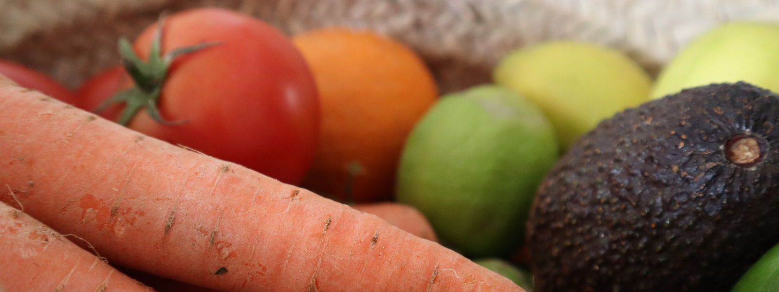 fresh vegetables and fruit in a basket